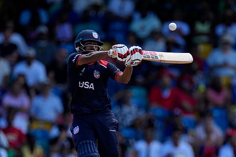 Harmeet Singh plays a shot against England